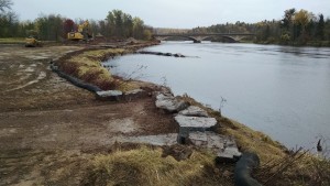 Bulldozers work on the Chambers Grove project that restored 1,000 feet of river bank of the St. Louis River. (NOAA)