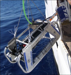 A TOAD camera sled is deployed from a small research vessel.