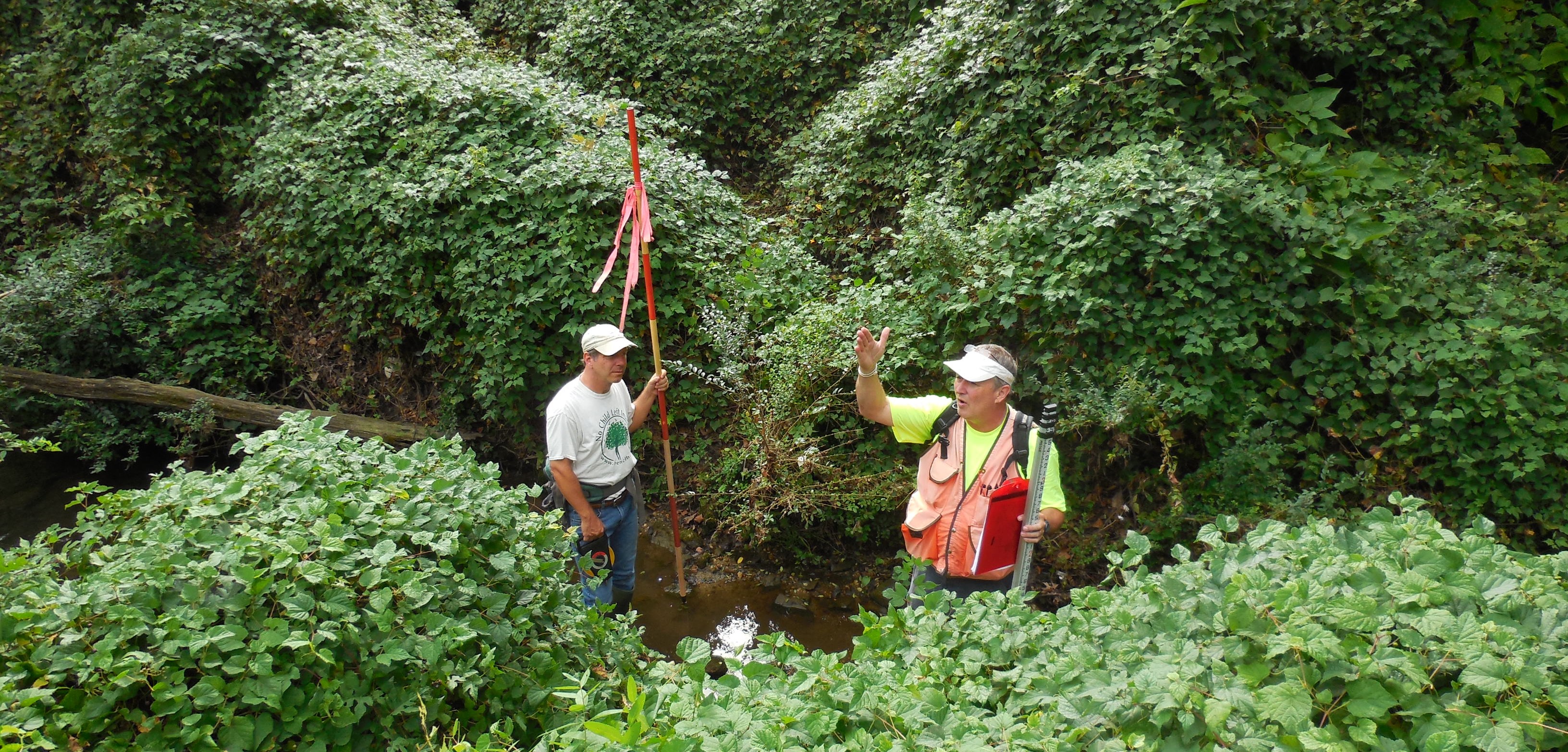 Sea Grant Extension Watershed Specialist Eric Buehl (right) and Chesapeake Bay Foundation Restoration Scientist Rob Schnabel assist with a stream assessment in the Town of Easton as part of an Envision the Choptank grant application to design two stream restoration projects. Credit: Sarah Hilderbrand, MD DNR.