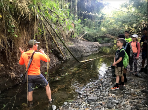 Children at Manell-Geus Habitat Focus Area Kids Camp learned about stream bank erosion and invasive bamboo species as major contributors to village flooding.