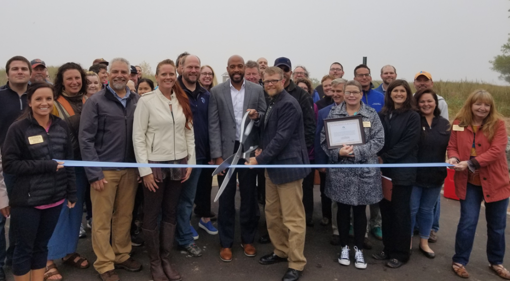 Ribbon-cutting to celebrate the re-opening of Wisconsin Point on September 20, 2019. Photo courtesy of the Superior Douglas County Area Chamber of Commerce. 